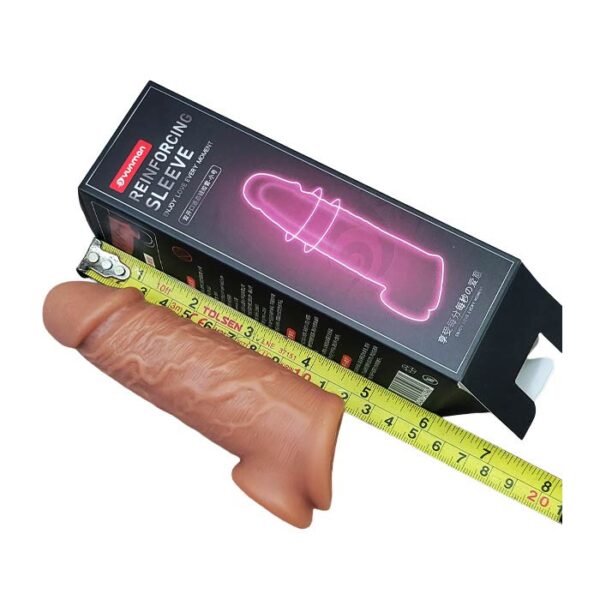 Brown reusable silicone sleeve measured with tape beside reinforcing sleeve package