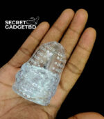 Clear extra dotted ribbed reusable silicone sleeve held in a hand